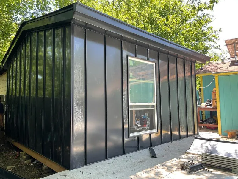 Black standing seam metal wall panels for Roof Inspection in Anthem